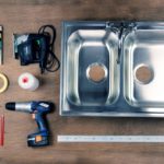 Preparing to install a kitchen sink.
