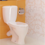 Toilet with oblique outlet.