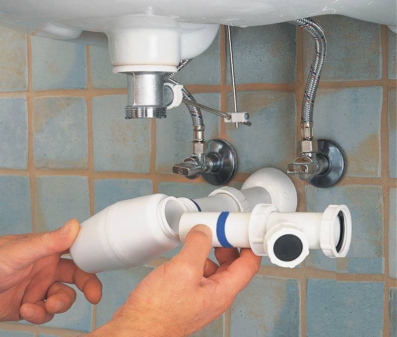 Siphon under the bathroom sink.