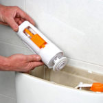 How to adjust the operation of a tank with a button?