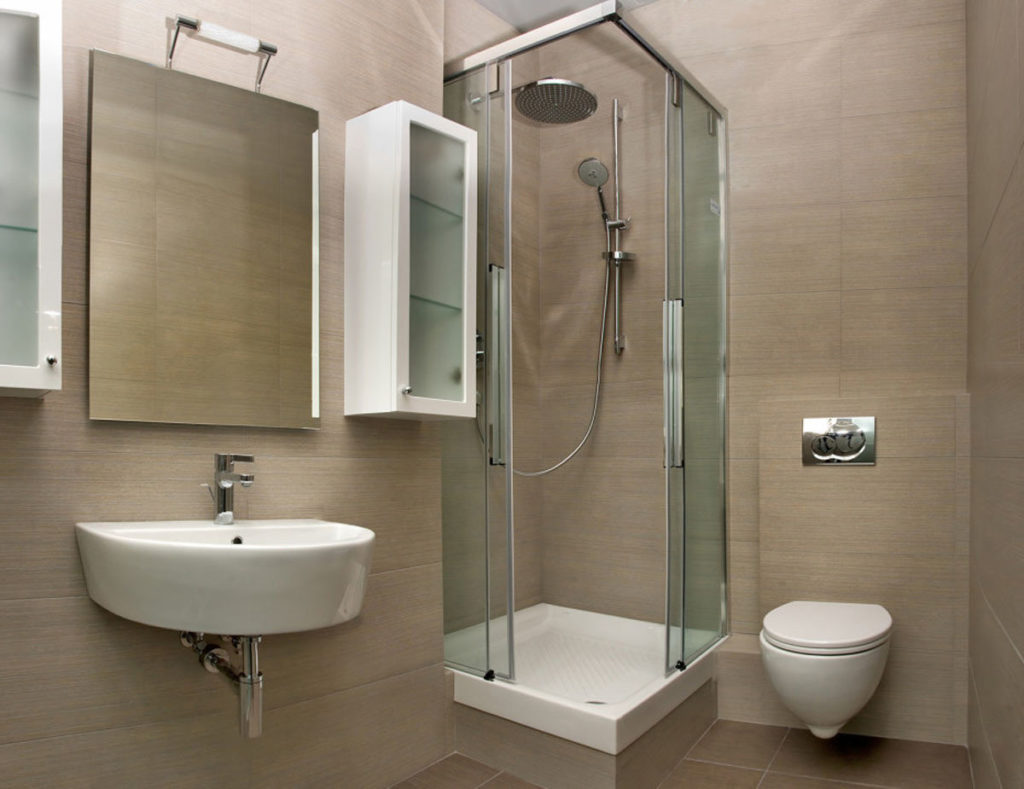 Small bathroom with shower corner.
