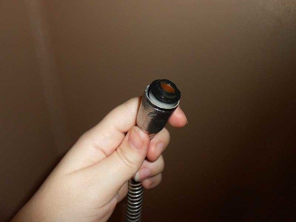 Unscrew the shower hose.