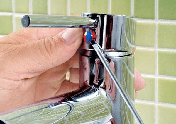 Use a screwdriver to open the plug.