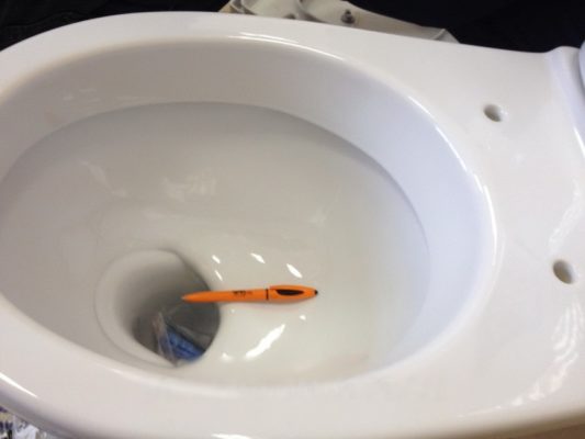 Why did Soviet toilets have a shelf?