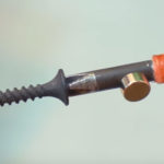 Magnetizing a screwdriver using a magnet.