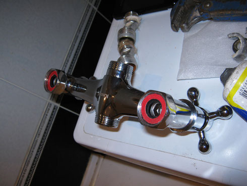 Installing the gasket on the mixer.