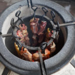 Cooking in tandoor.