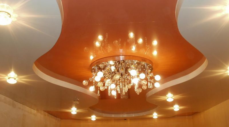Chandelier on a suspended ceiling.