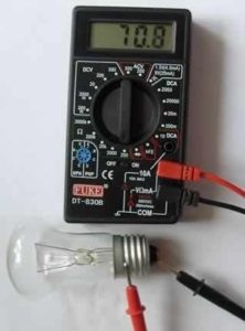 Testing an incandescent lamp.