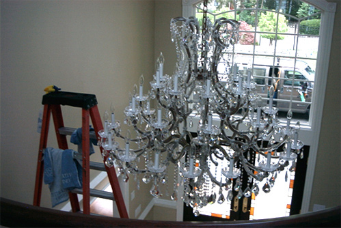 chandelier and stepladder
