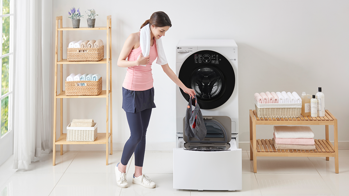 Washing machine with two compartments