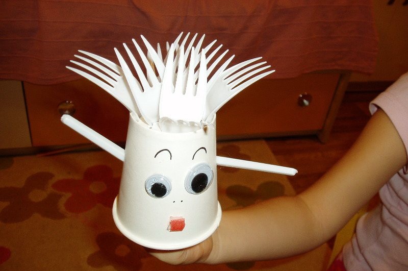 Doll made from disposable forks and a plastic cup