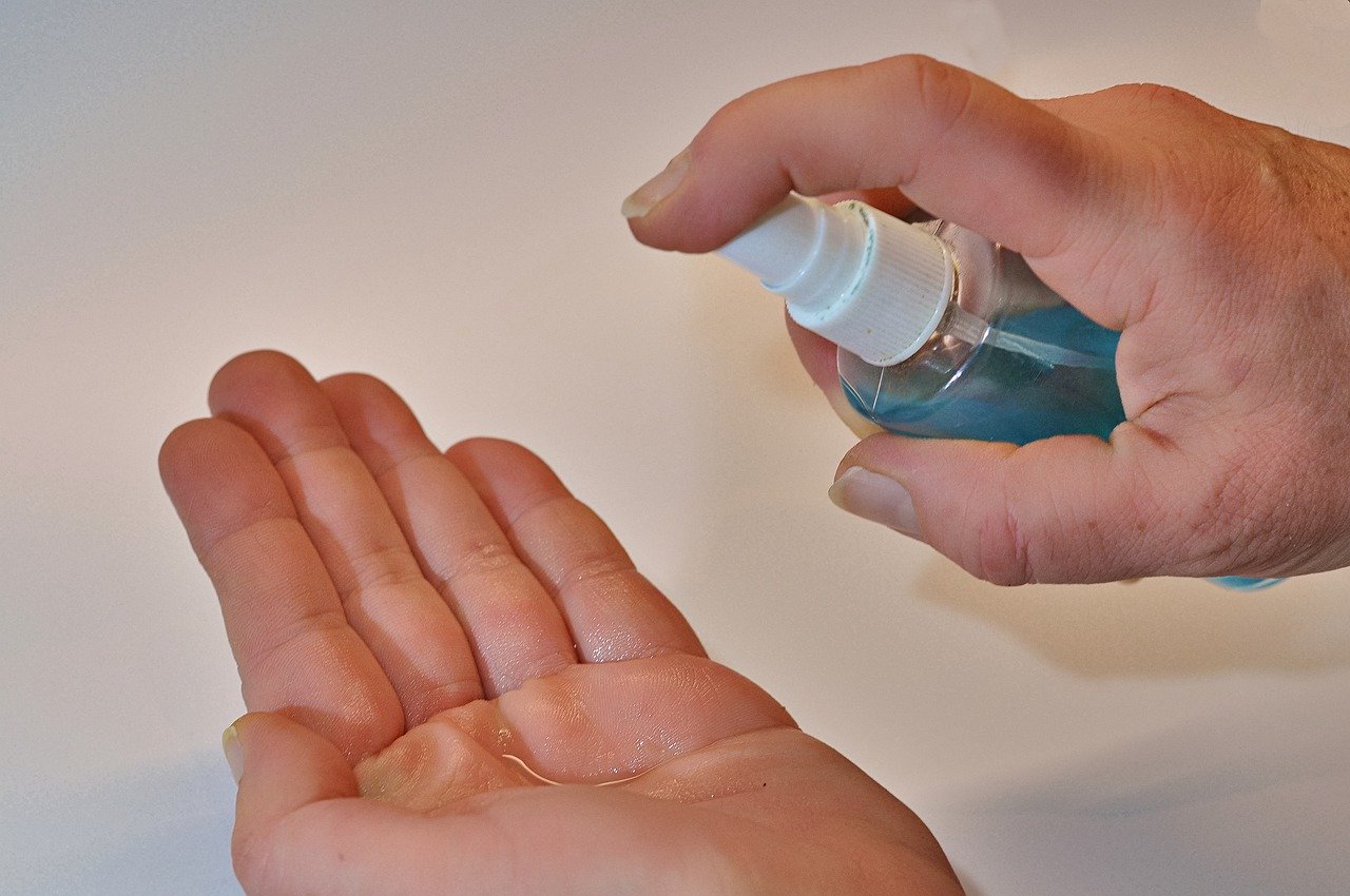 Treating hands with antiseptic