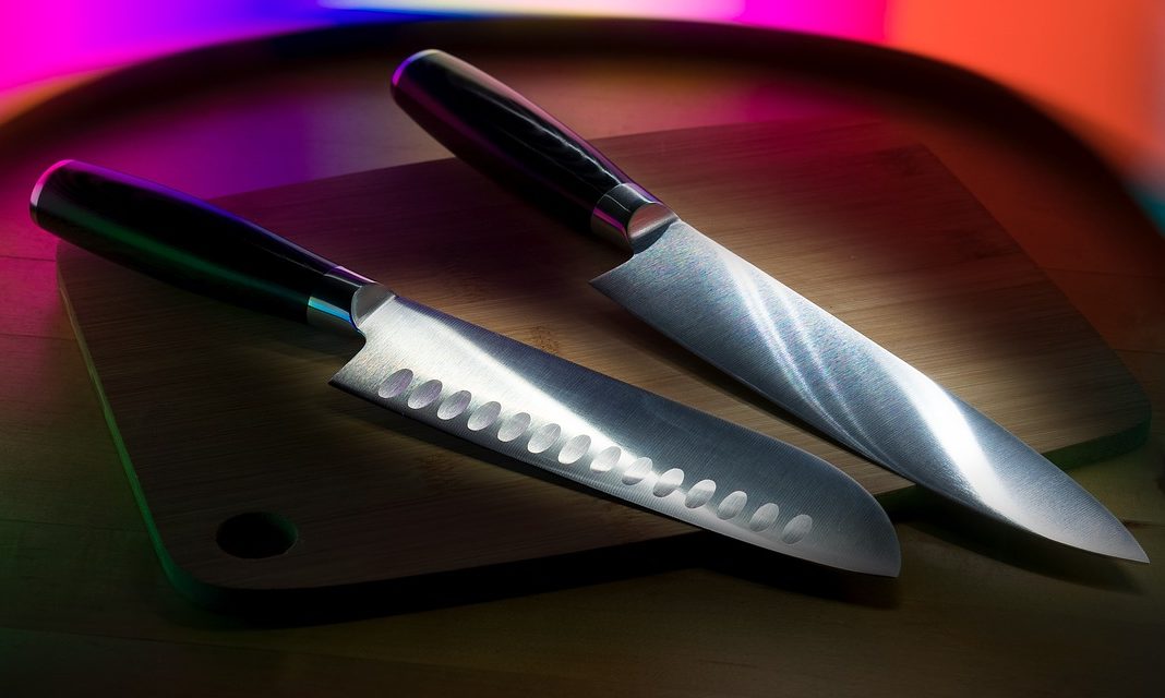 Kitchen knives on a cutting board