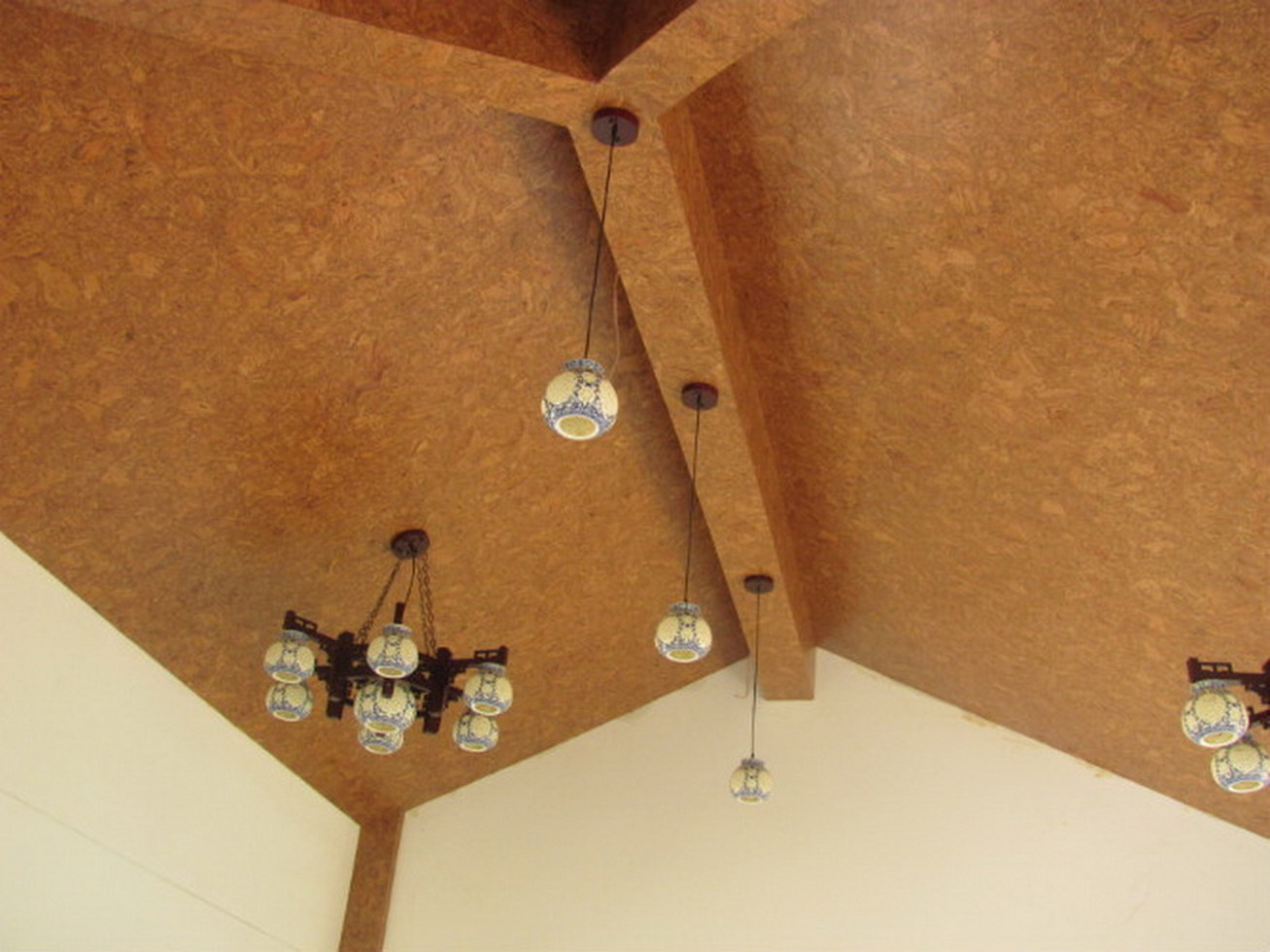 cork sheets for the ceiling in a wooden house