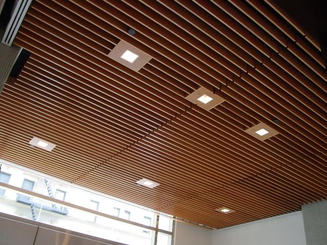 aluminum batten for the ceiling in a wooden house