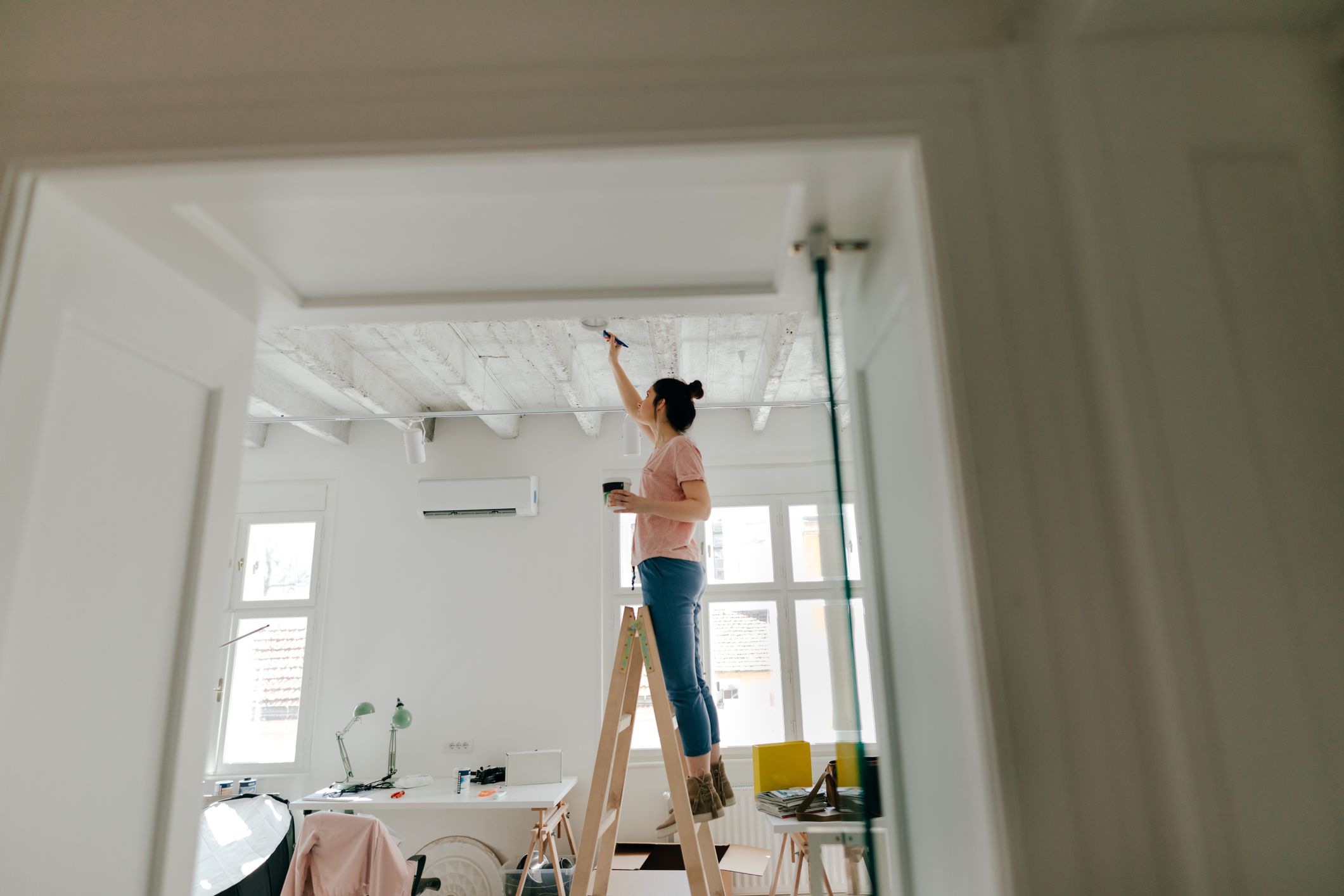painting the ceiling in a wooden house