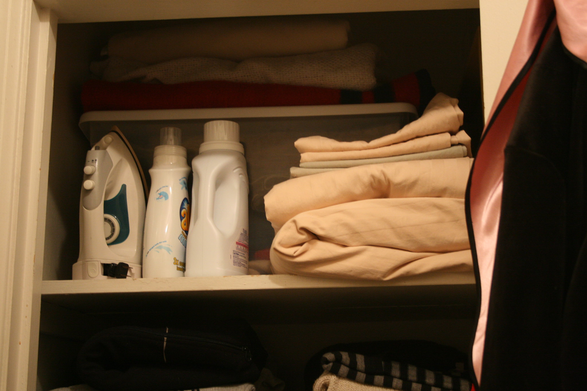 Bed linen on closet shelves