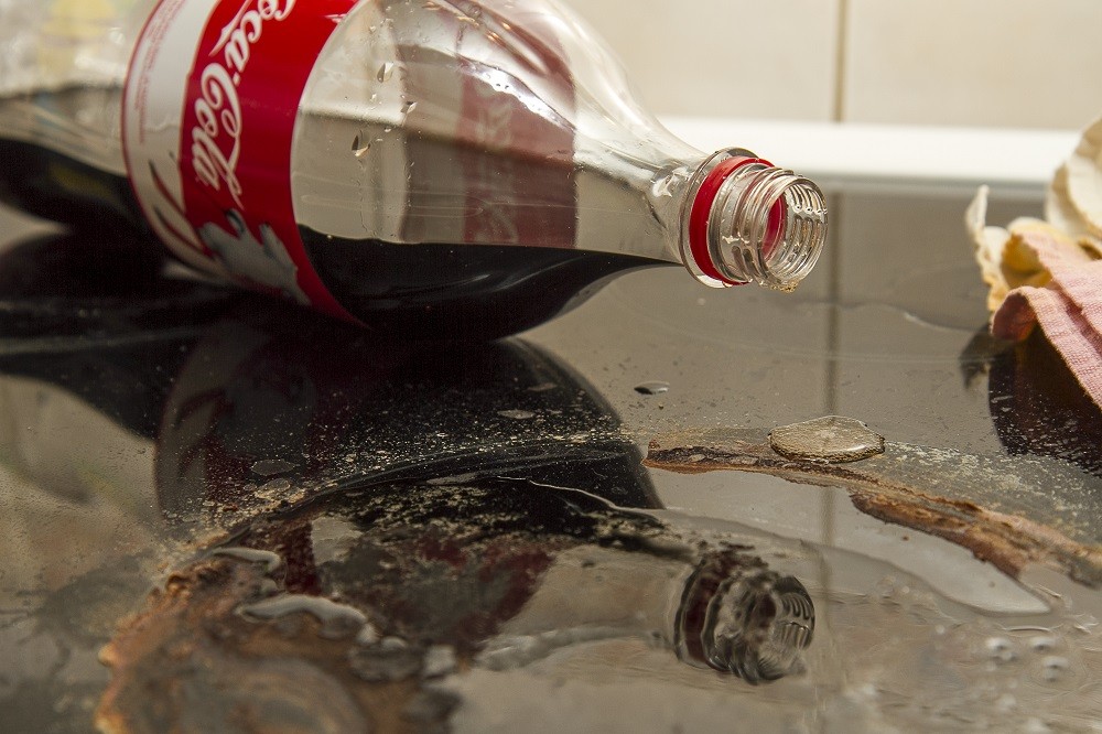 Coca-Cola on a dirty stove