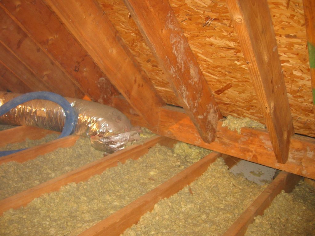 Ceiling insulation with sawdust.