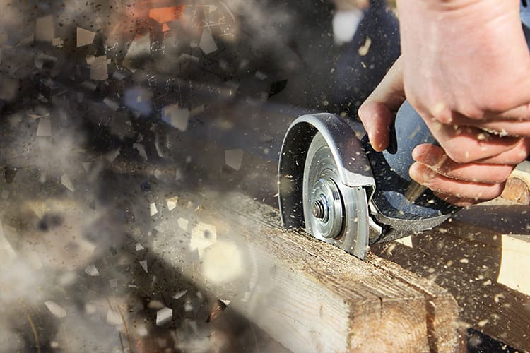 sawing wood with a grinder