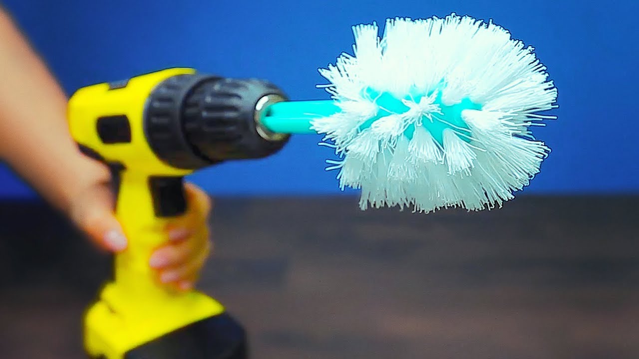 cleaning the toilet with a screwdriver