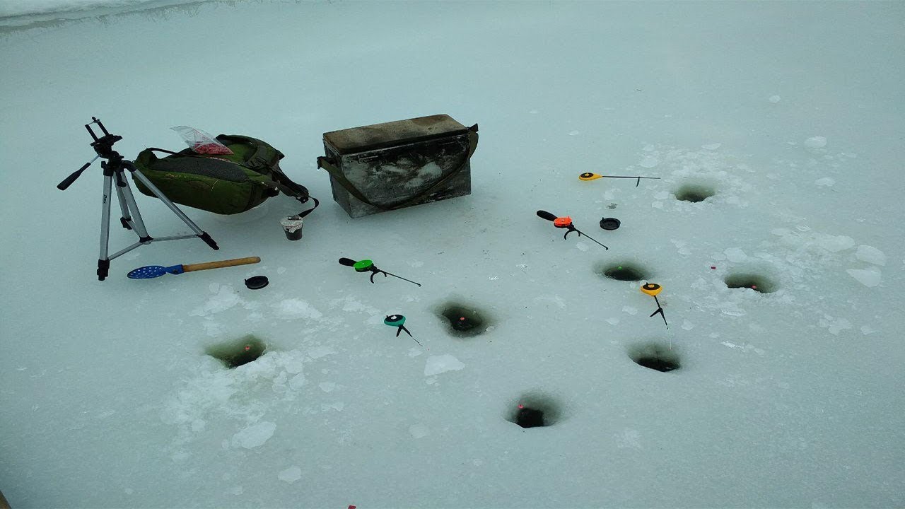 holes for winter fishing with a screwdriver
