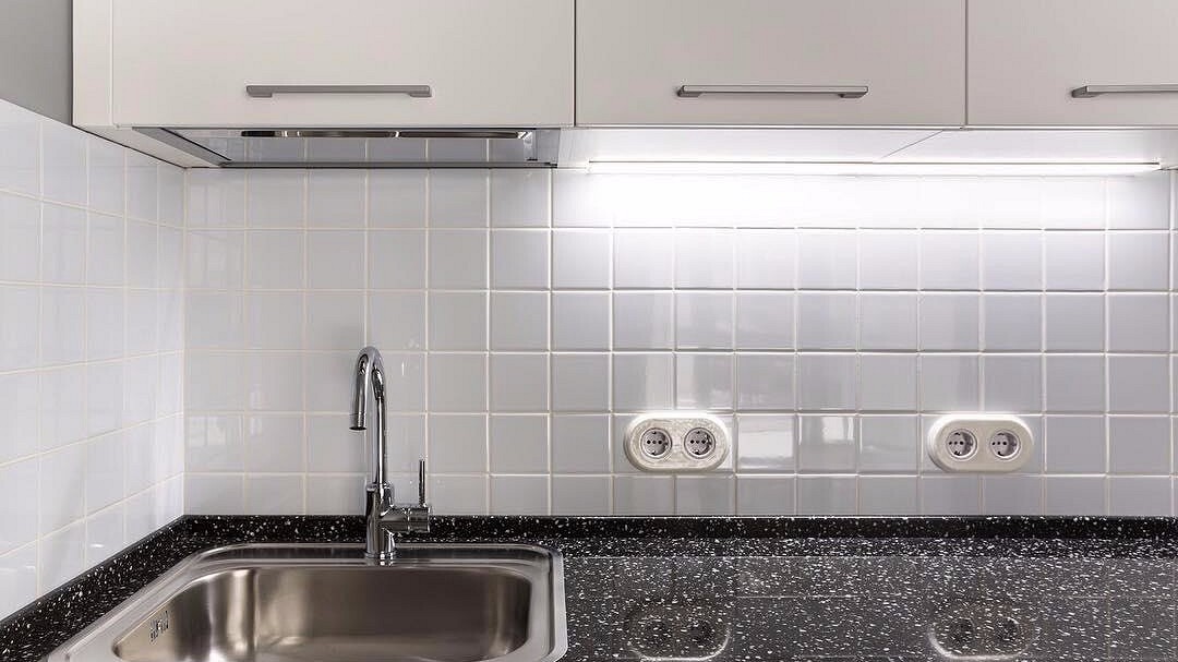 sockets in the kitchen near the faucet