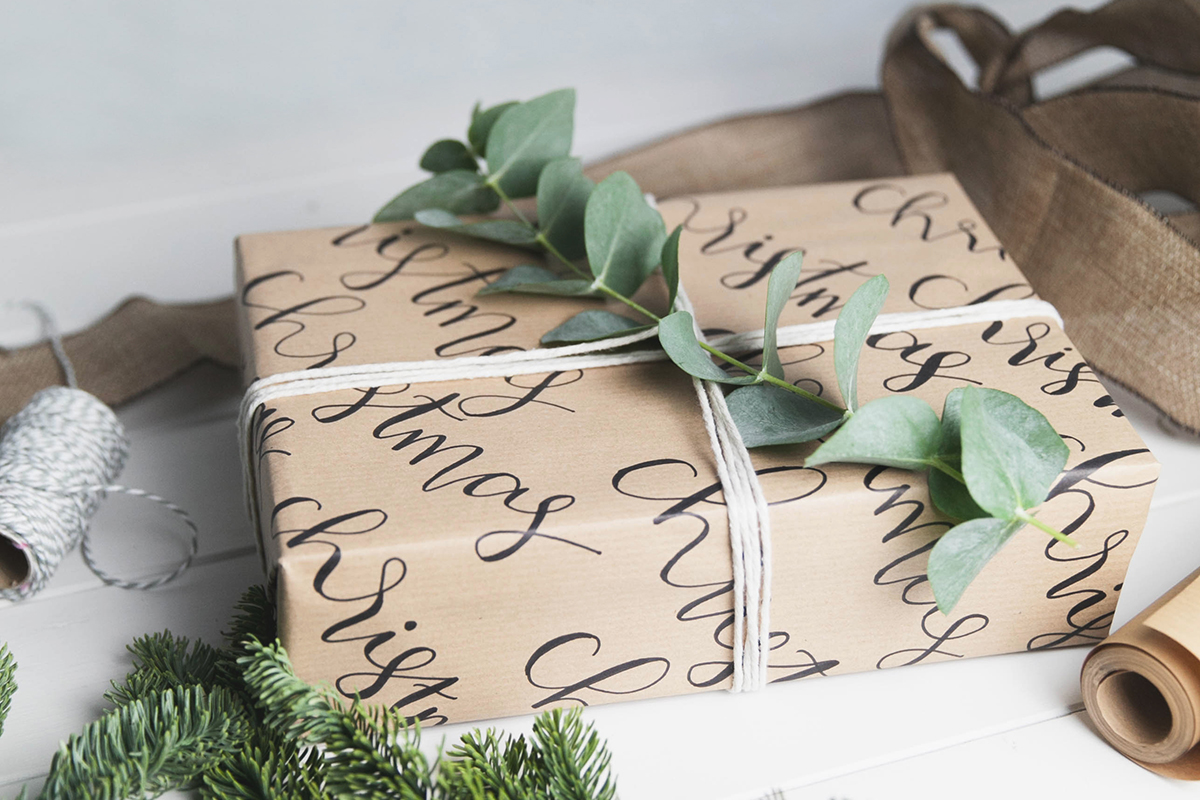 Decorating a gift with a plant