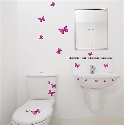 decorating the wall behind the toilet with vinyl stickers