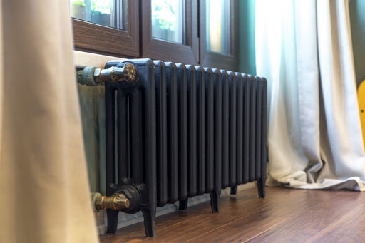 Cast iron battery in a modern interior