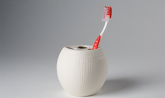 Cup for toothbrushes