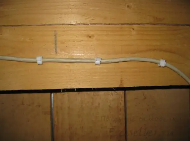 Clamps for attaching wires to the wall
