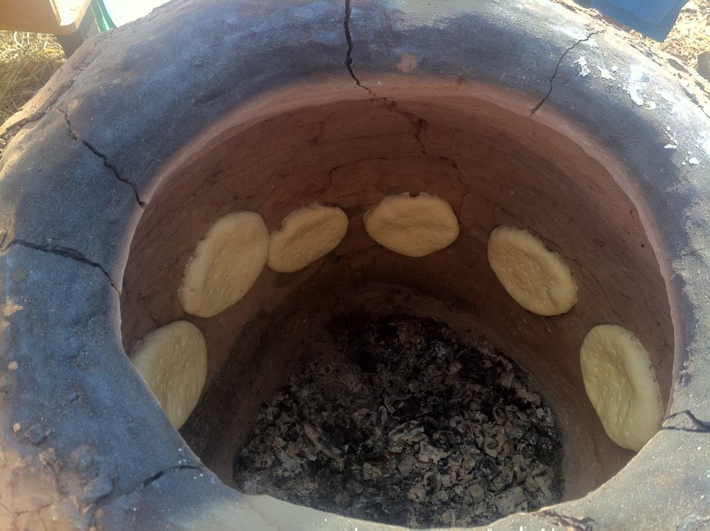 Tandoor in the ground.