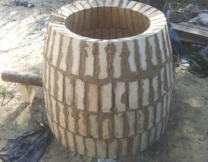 Tandoor made of bricks on a stick.