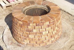 Tandoor made of brick on a base.