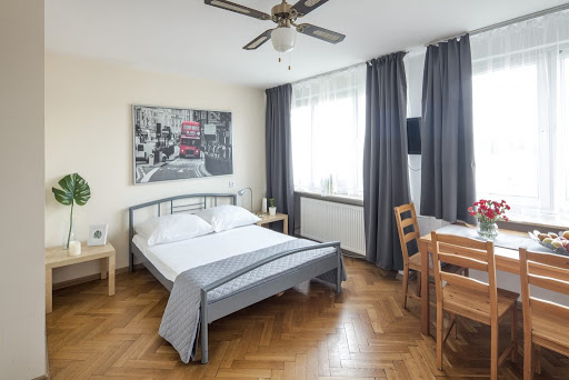 Storing an ironing board under the bed