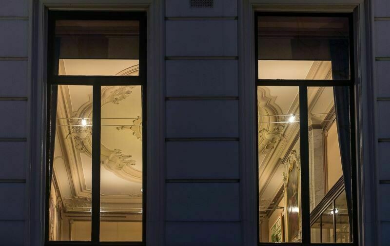 Why were the curtains removed from the windows?