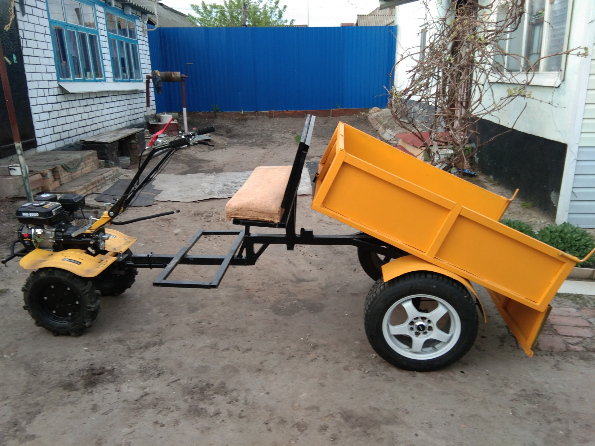 Motoblock with trailer.