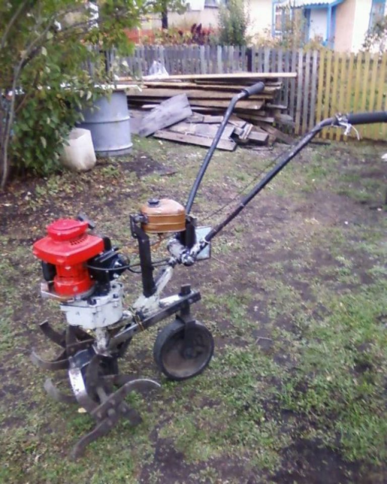 Chainsaw-based cultivator.