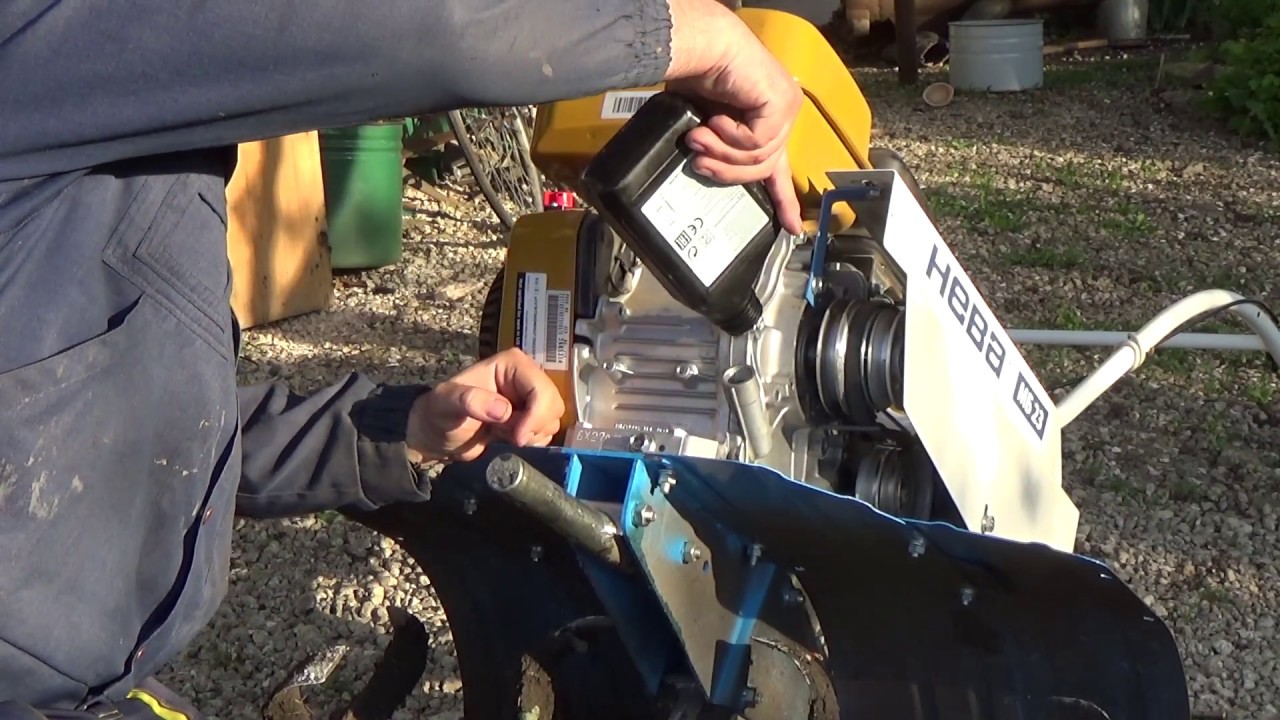 changing the oil in a walk-behind tractor