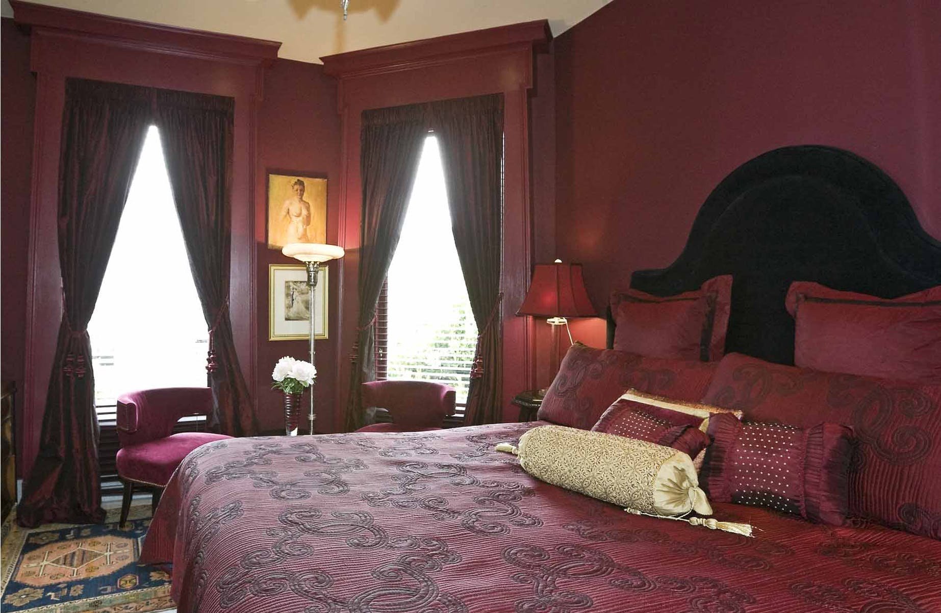 Bright burgundy bedroom.