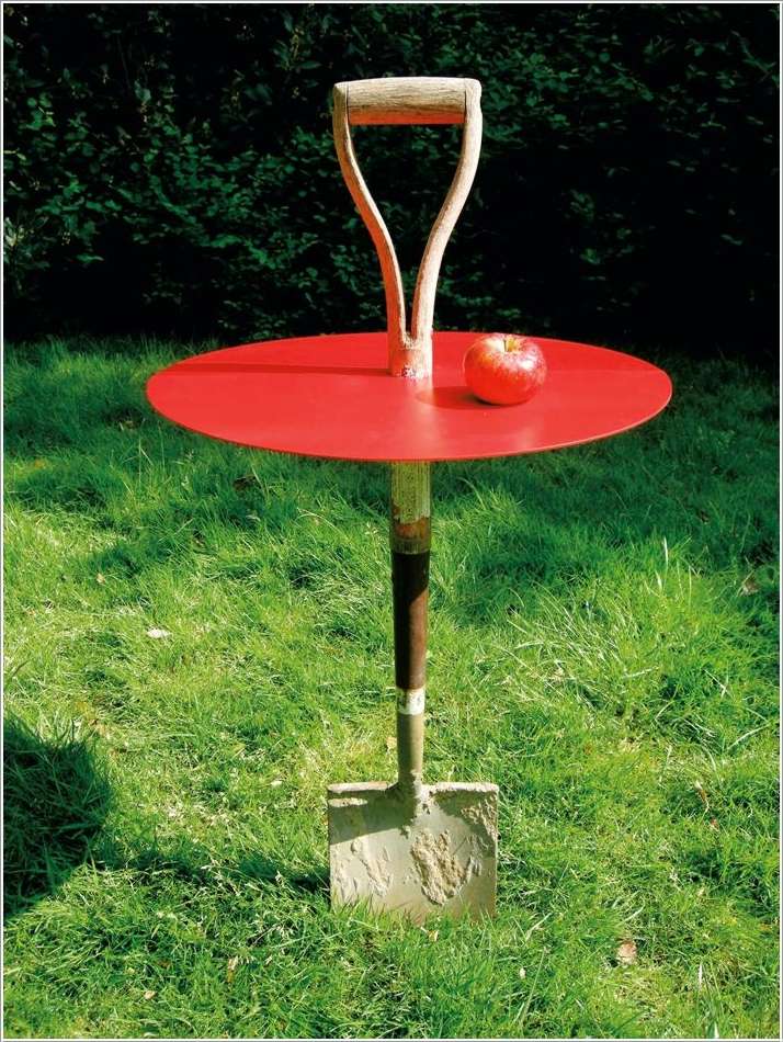garden table made from a broken shovel