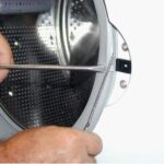 How to remove shock absorbers from a washing machine