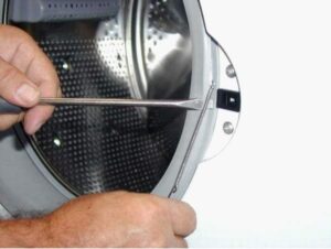 How to remove shock absorbers from a washing machine