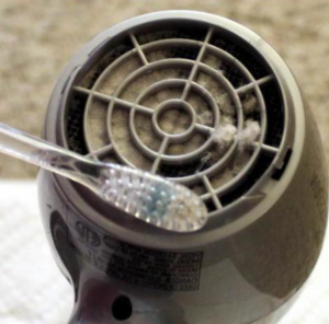 Cleaning dirt from hair dryer crevices
