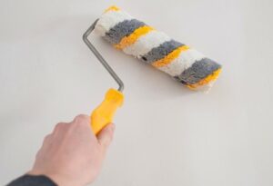 Why do you putty the walls before wallpapering?