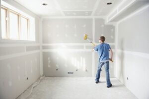 Is it necessary to prime drywall before puttying?