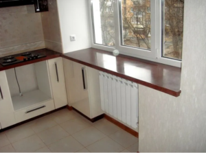 The height of the window sill in the house in the kitchen