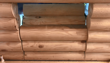 Stove in a bathhouse on a wooden floor 3